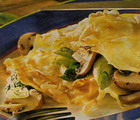 Pancakes with vegetables and ham